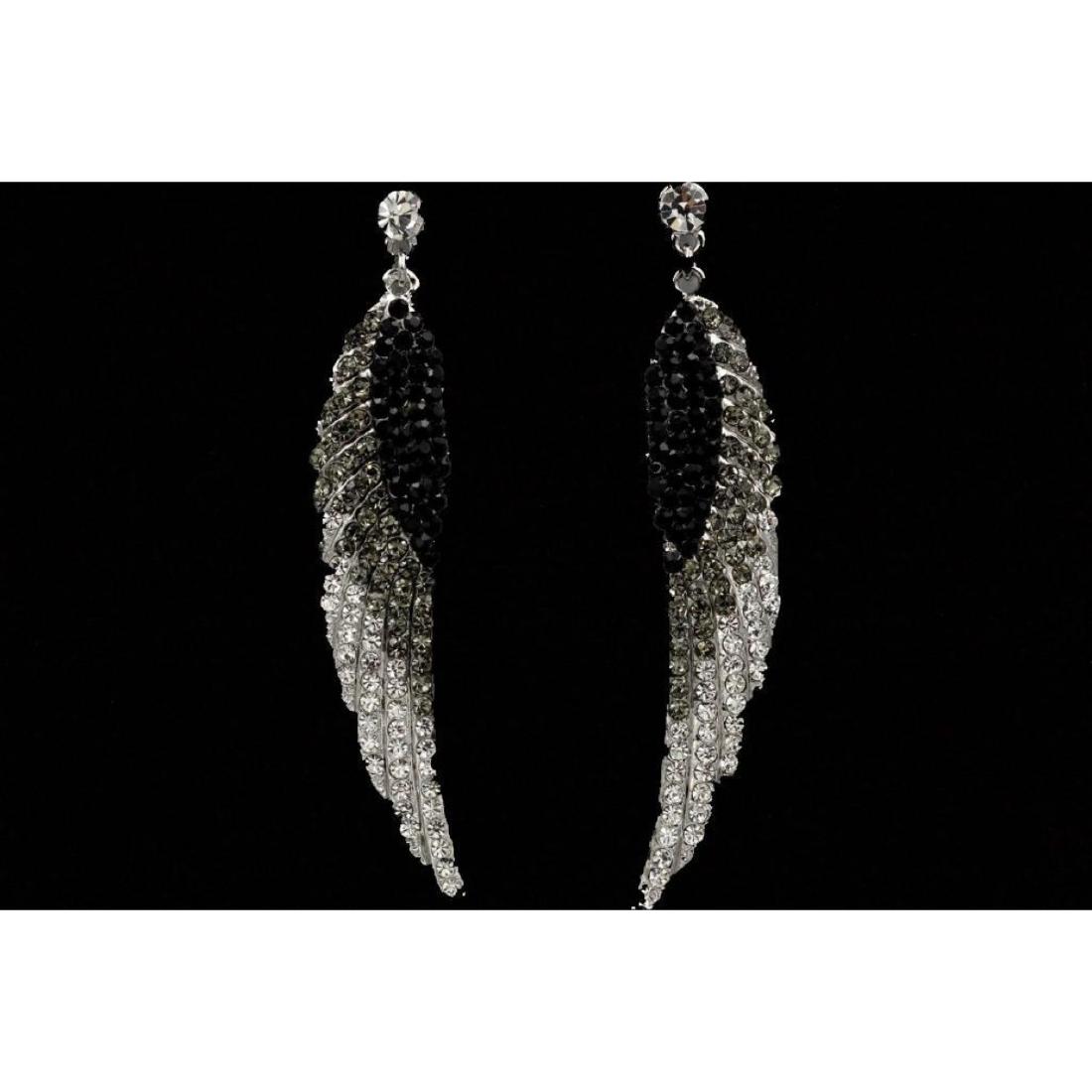 Black Gray & Clear Czech Crystal Feather Earrings: Black, gray & clear Czech crystals set into rhodium platedÂ 3" L bird feather styleÂ earrings. 9781-031018-EB-07266