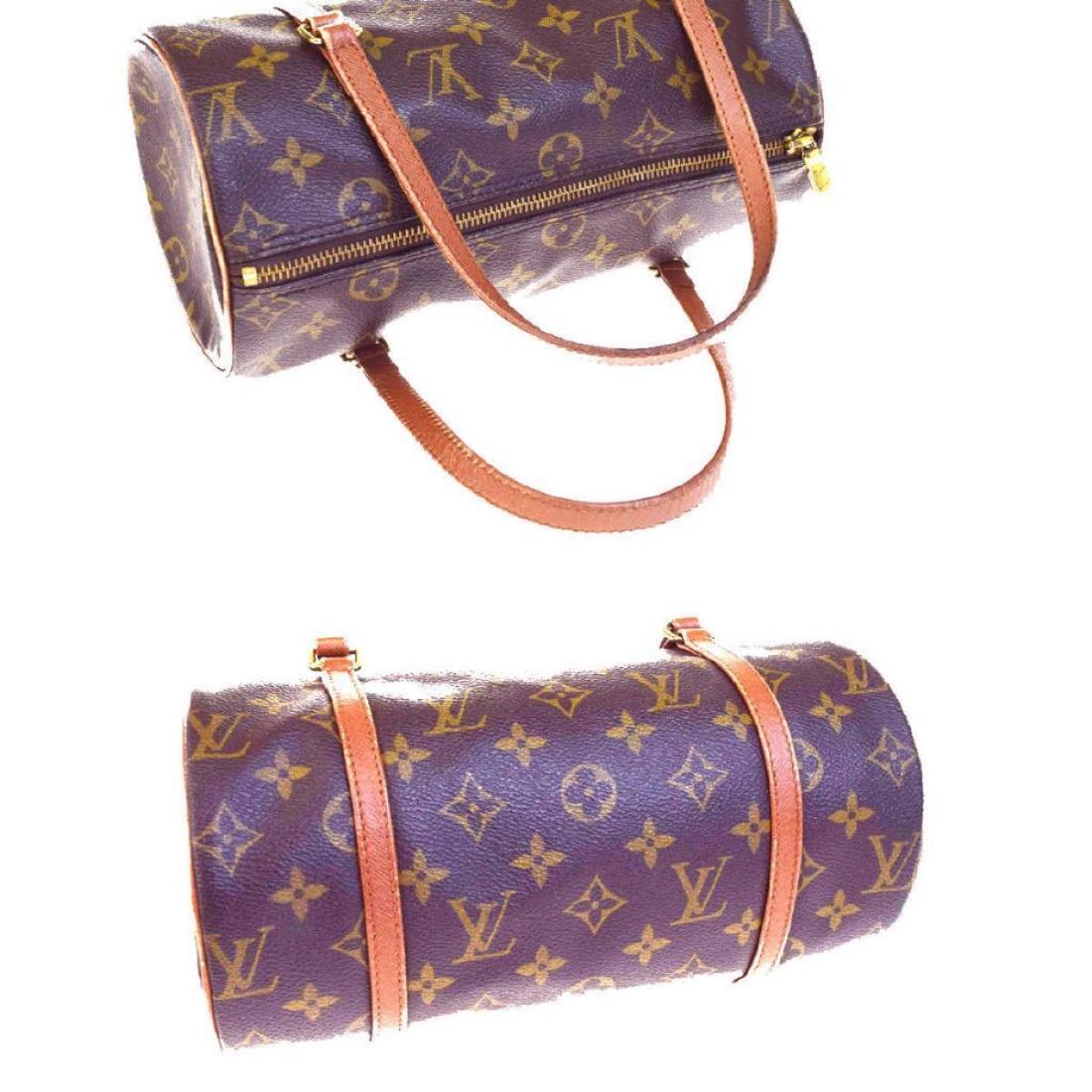 Louis Vuitton Papillon 26 Hand Bag Monogram Leather: Brand LOUIS VUITTON Style Shoulder Bag Color/Material Brown/Monogram Leather Country of manufacture France Serial Number Unclear due to deterioration. Size Size (inch) W 10.2 x H 5.1 x D 5.1 "(approx.