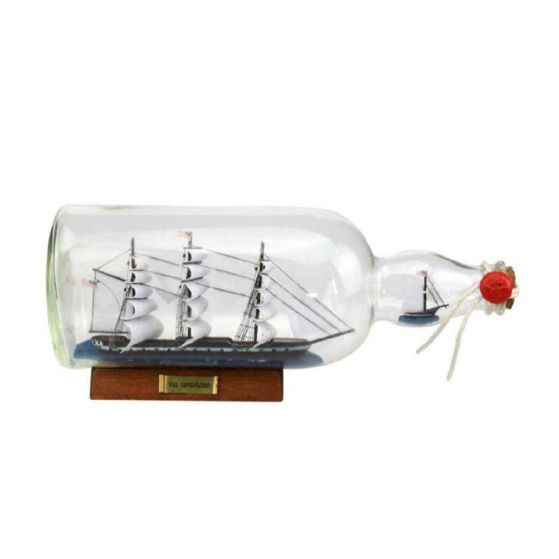 USS Constitution Model Ship in a Glass Bottle 11": USS Constitution Model Ship in a Glass Bottle 11" FULLY ASSEMBLED â€“ READY FOR IMMEDIATE DISPLAY This is not a Ship-in-a-Bottle kitÂ The ship in a bottle is one of the classic items of nautic
