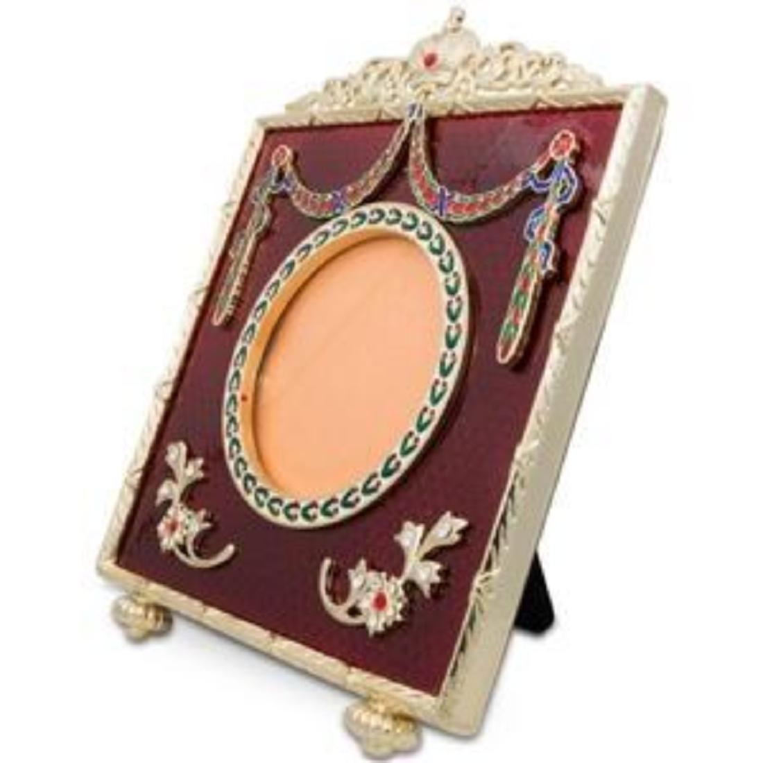5" Faberge-Inspired Square Red Enameled Guilloche: 5" Faberge Square Red Enameled Gullioche Russian Antique Style Picture Frame The Russian Royal Picture Frame is in a royal red guilloche enamel with golden mounted edges. The top of the photo frame is