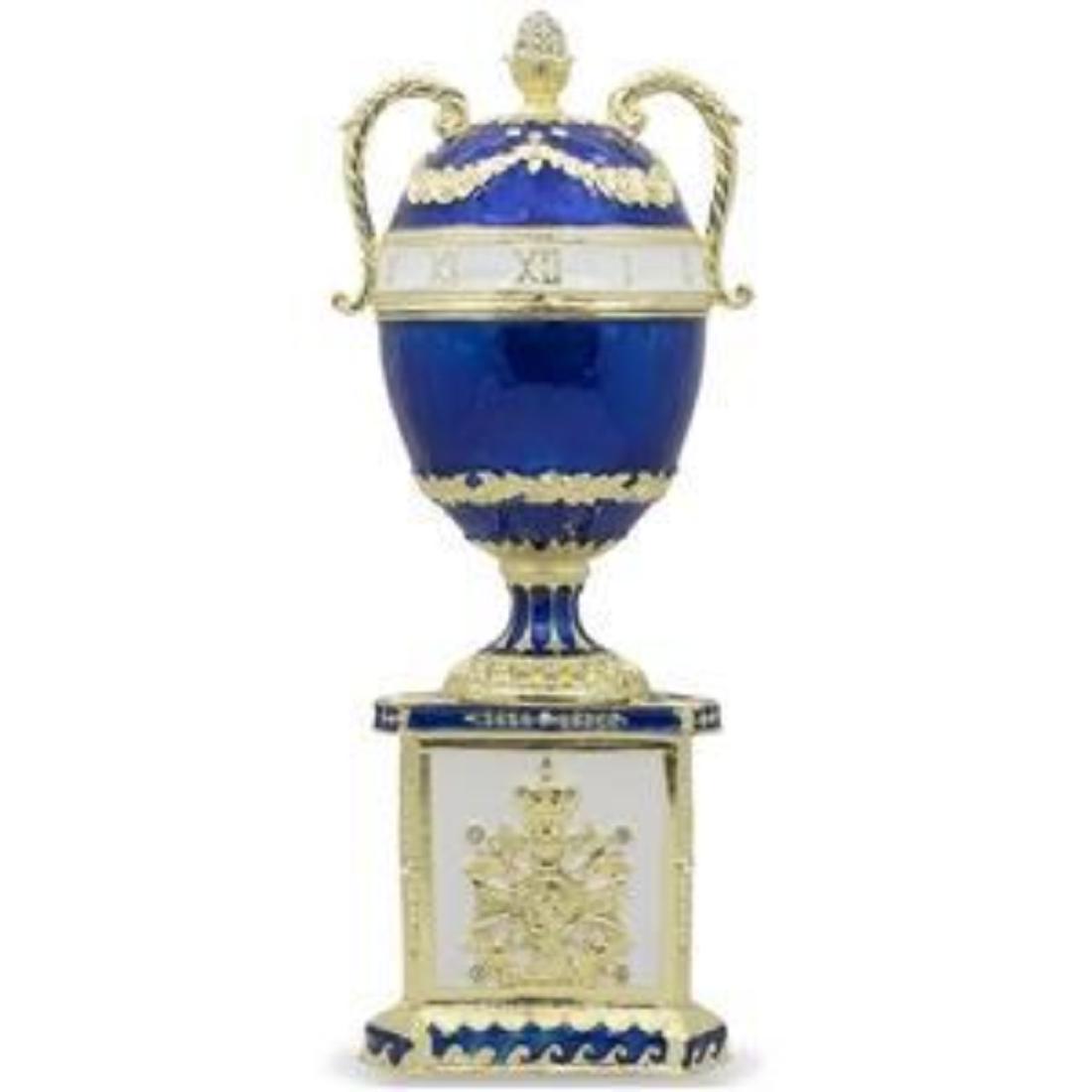 1895 Blue Serpent Clock Russian Faberge-Inspired Egg 7": 1895 Blue Serpent Clock Faberge Egg Peter Carl Faberge is the world's most famous jeweler who created eternally original pieces of art. The series of Easter eggs created by Faberge for the Russian Imp