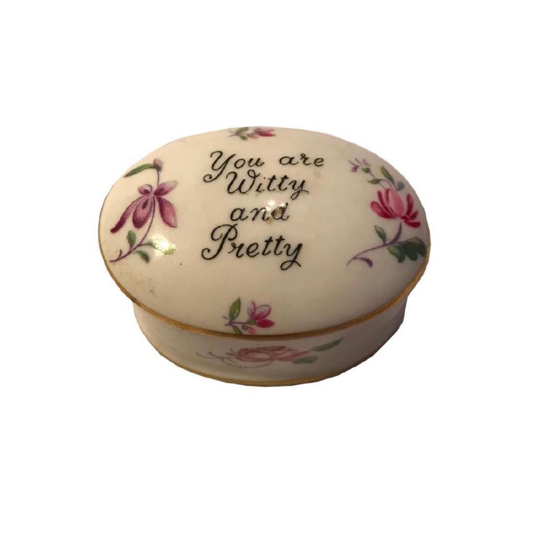 Antique Crown Staffordshire Trinket Jewel Pill Box: Antique, c1900Â English Crown Staffordshire porcelain trinket, jewel, Â box, decorated with gold gilt, lovely florals & the inscription painted on the lid, "You are Witty and Pretty". 2 1/2" L X 1