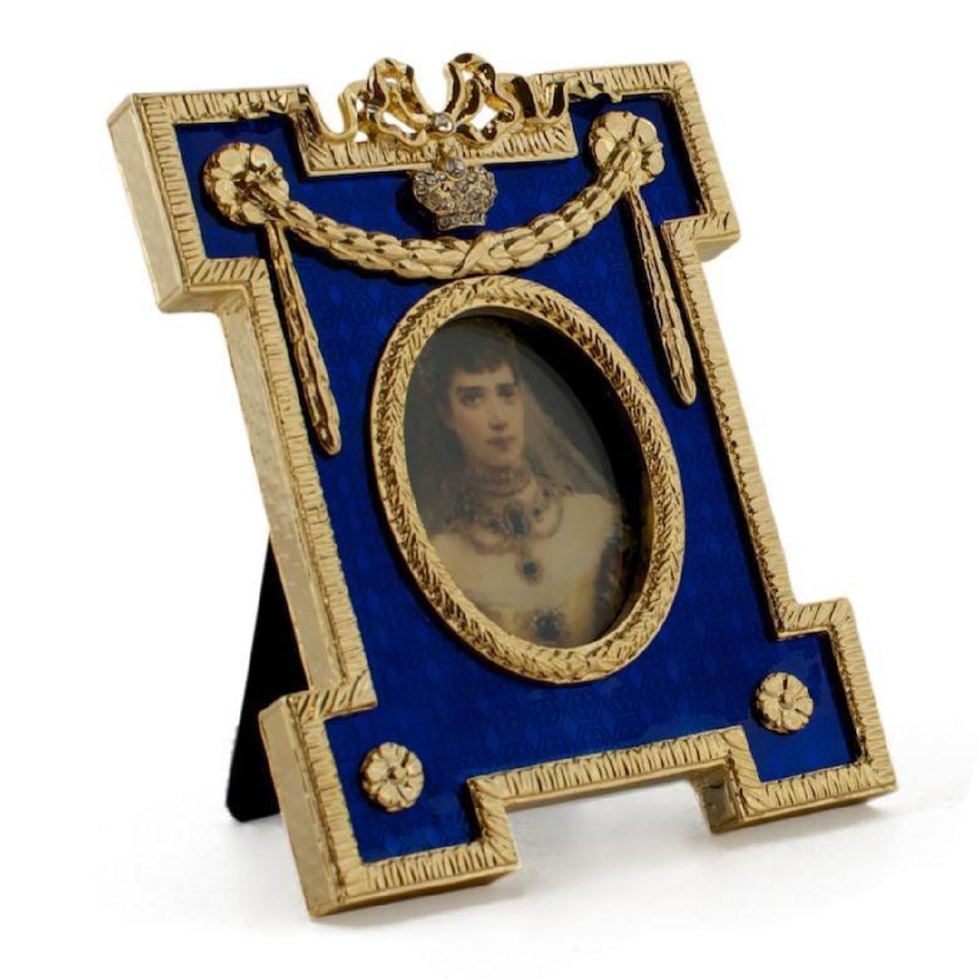 Blue Enameled Guilloche Russian Royal Picture Frame: Blue Enameled Guilloche Russian Royal Picture Frame The photo frame is in two colors gold-mounted green enamel surrounded by a crystal set ribbon tie suspended by a laurel garland. The frame'sedges ar