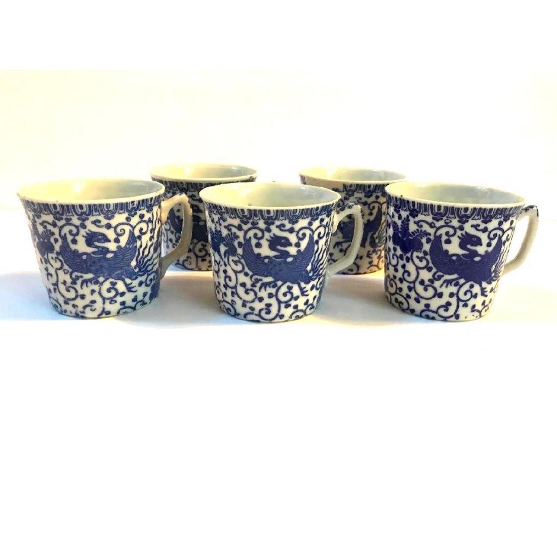Vintage Set Japanese Phoenix Flying Turkey Cups: Set of 5 vintage c.1920â€™s - 1930â€™s Japanese blue & white "Phoenix" or "Flying Turkeyâ€ cups - also known as Blue Howo China. Â * one cup marked â€œMade in Japanâ€ on bottom.