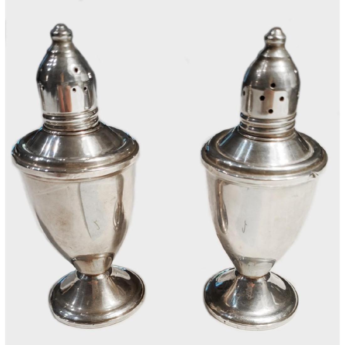 Antique Pair Of Sterling Silver Salt and Pepper Shakers: An Antique Pair Of Sterling Silver Salt and Pepper Shakers Marked STERLING On The Bottom.