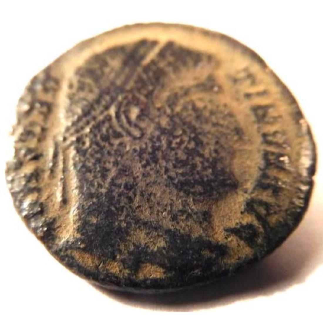 Bronze coin of Constantine I (307-337 A.D.): Constantine I, known as "Constantine the Great", was born around 274 A.D. In 306 A.D. he was proclaimed Caesar at the death of his father, Constantius Chlorus. Constantine famously converted to Christ