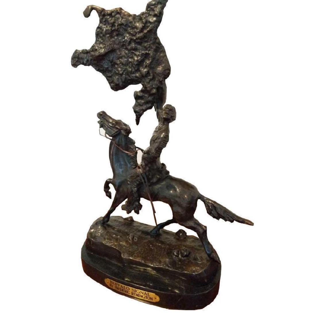 Frederick Remington Bronze Inspired "Buffalo Signal": One of the rarer of Frederic Remington's 22 bronze sculptures, The Buffalo Signal was created by the artist as a gift for a young friend with the agreement that only one cast would be made. Remington'