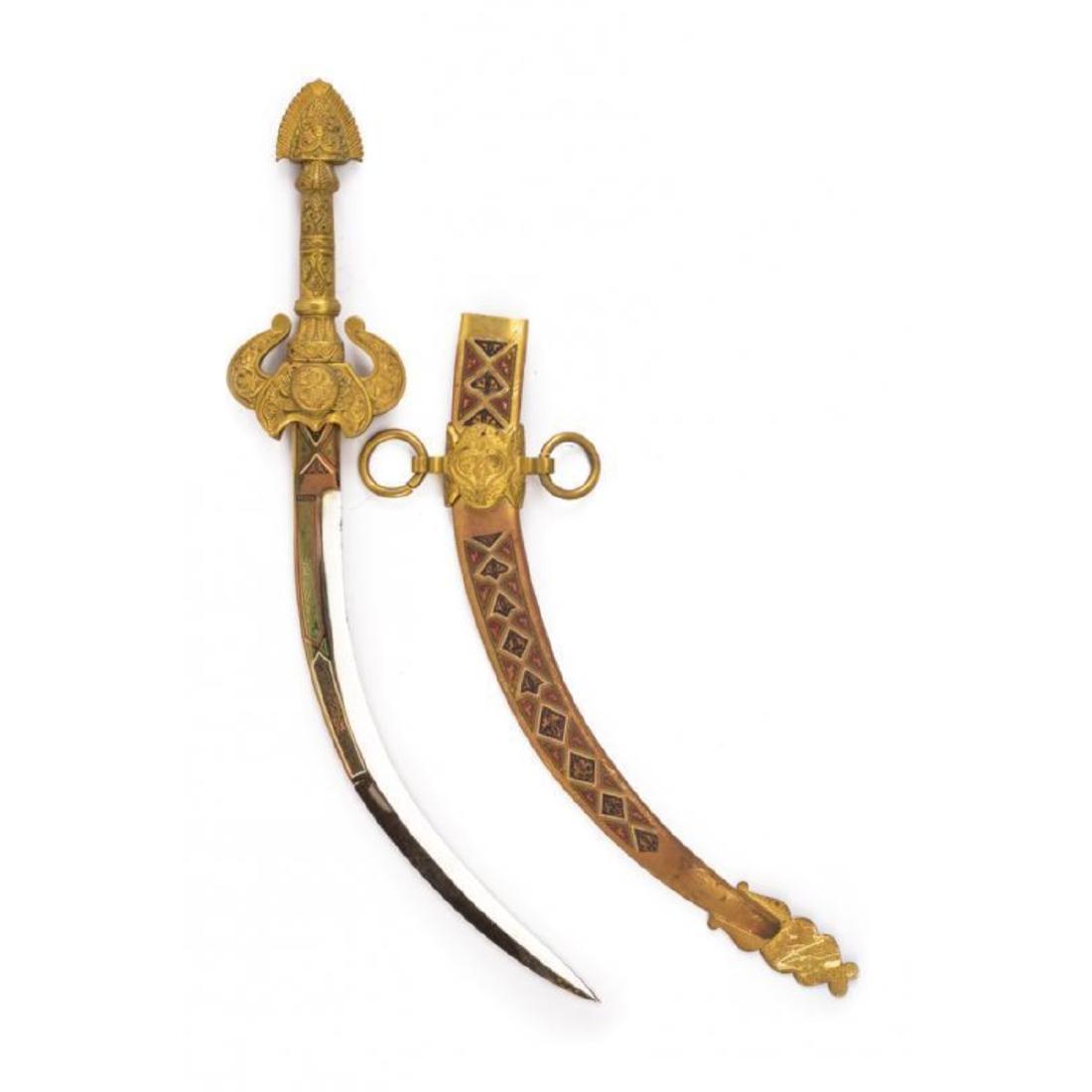 20thc Ornate Brass Motif "Toledo" Dagger: 20thcÂ Toledo dagger, theÂ blade very curved to a thread & counter-thread decorated, with colored engravings with floral & geometric motifs, marked "TOLEDO"; massive brass handle engraved with flo