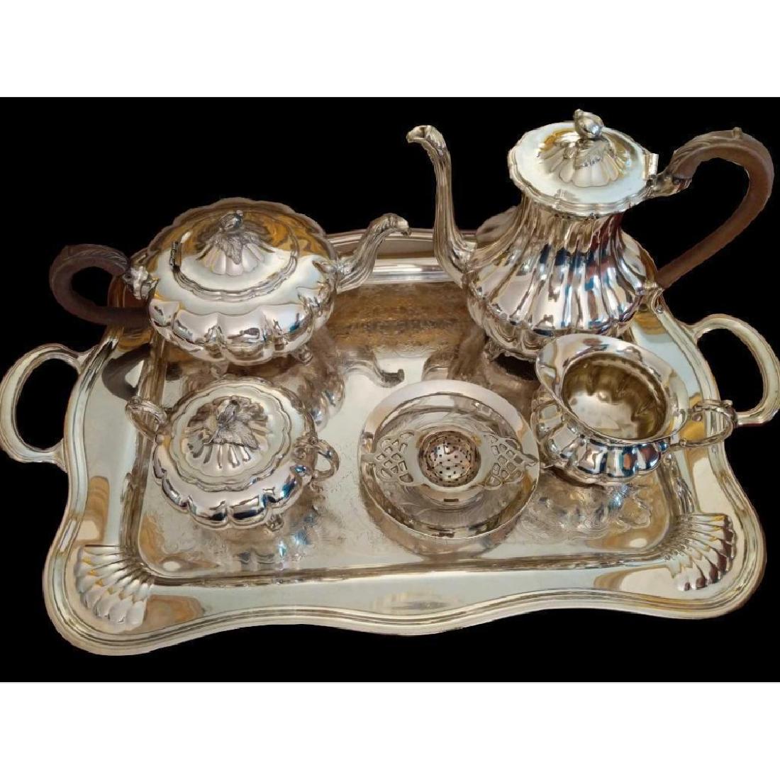 'Melon' Community Plate Tea Service & Serving Tray: Reproduction by Community silver plated tea set. "Melon" pattern, includes tray: 31" x 18" See Description Early 20th Century Community Rare to find entire set with tray