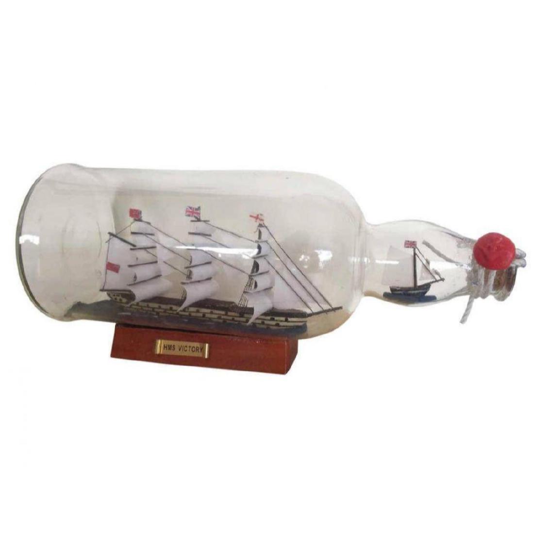 HMS Victory Model Ship in a Glass Bottle 11": HMS Victory Model Ship in a Glass Bottle 11" FULLY ASSEMBLED â€“ READY FOR IMMEDIATE DISPLAY This is not a Ship-in-a-Bottle kitÂ The ship in a bottle is one of the classic items of nautical de