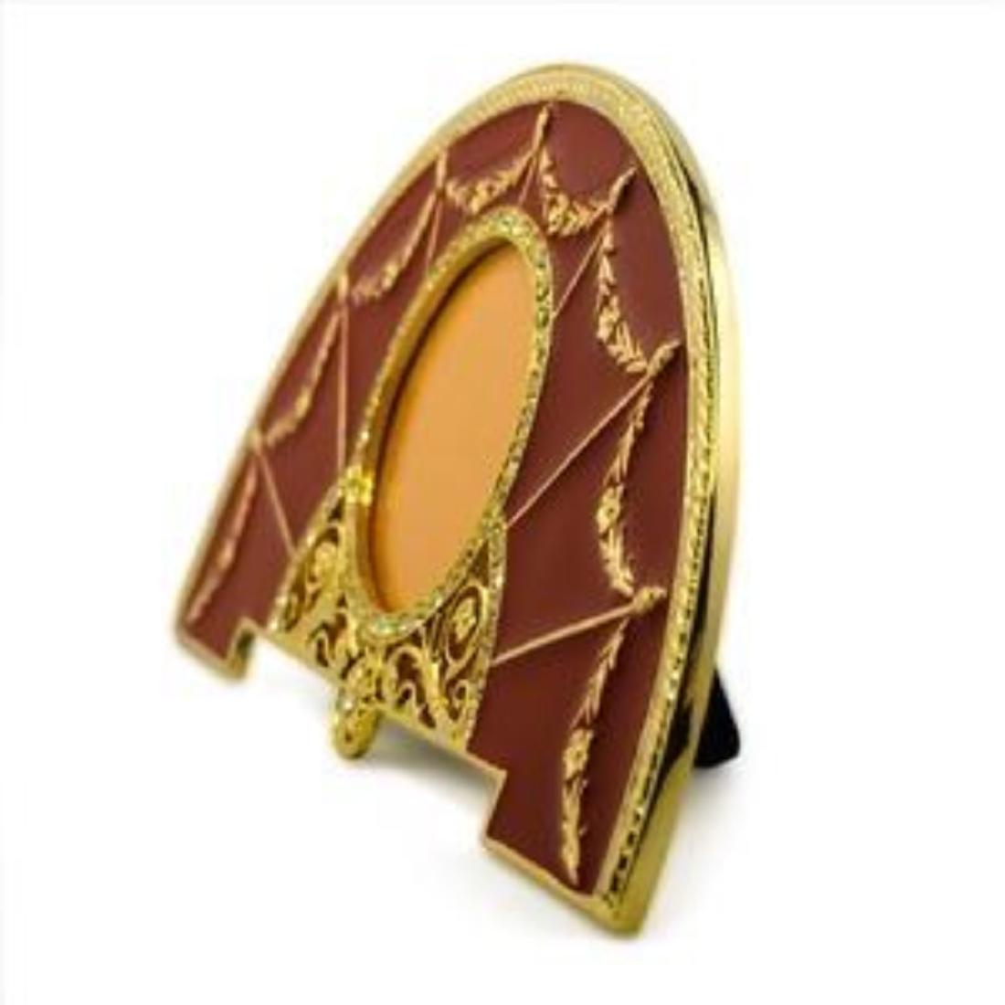 6.5" x 1.75" Faberge-Inspired Red Enameled Guilloche: 6.5" x 1.75" Faberge Red Enameled Guilloche Semicircular Russian Antique Style Picture Frame Â The picture frame is in two colors enamel surrounded by a crystal set ribbon tie suspended by a laurel