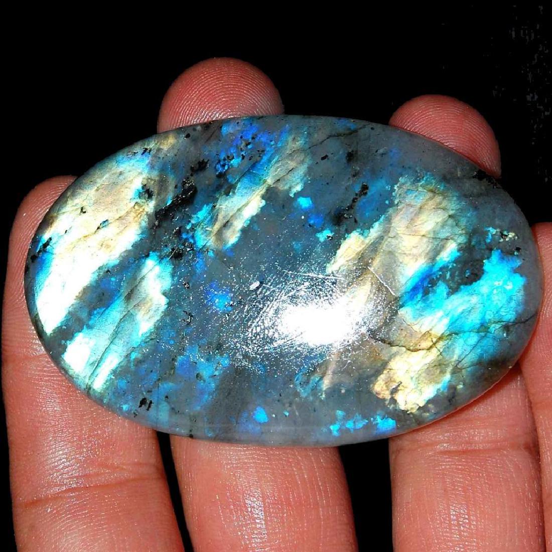 Huge 181ct Natural African Rainbow Labradorite Gemstone: Rare, huge size, natural/ untreated cabochon, rainbow labrodorite.181cts.Â Opaque transparency.Â 41mmÂ XÂ 7mm. African origin gemstone. 10314-050118-EB-23162