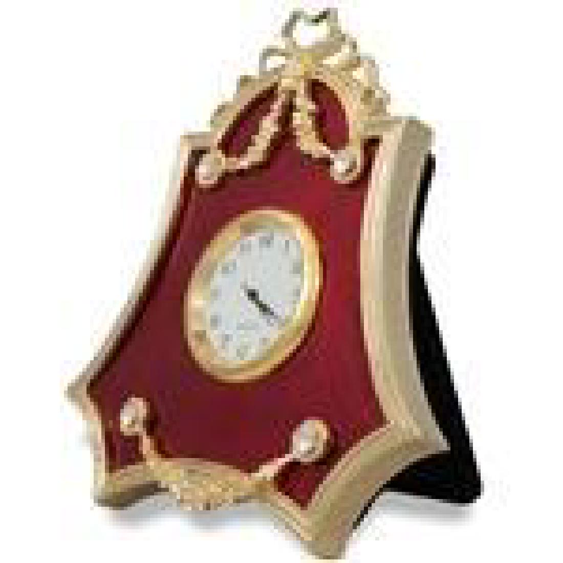 4" Faberge-Inspired Red Enameled Guilloche Russian: 4" Faberge Red Enameled Guilloche Russian Antique Style Clock The framed clock is in two color gold-mounted red enamel surrounded by a crystal set ribbon tie suspended by a laurel garland. The frame's