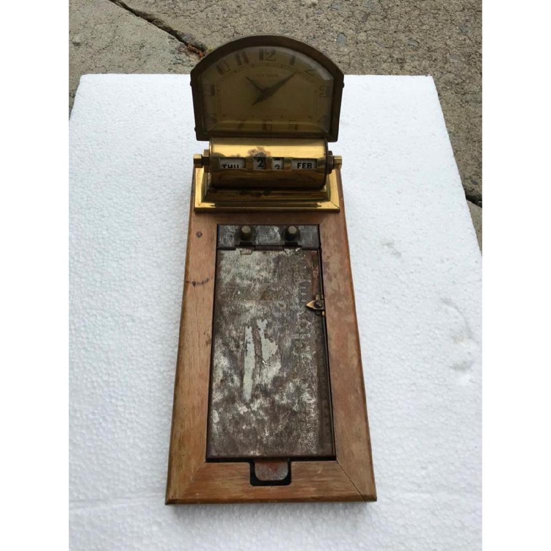 Art Deco New Haven Desk Accessory, Clock, Calendar,: Art Deco era desk accessory, telephone flip address book, register, with mounted New Haven clock & attached rolling calendar. 10" L X 5" W.