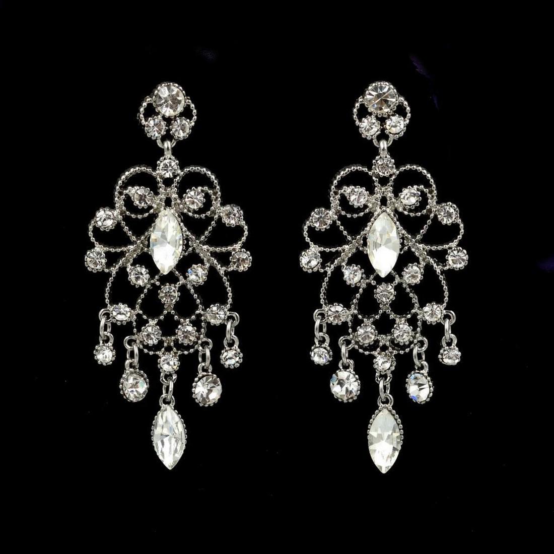 Rhodium Plated Clear Crystal Pearl Chandelier Drop: Rhodium Plated Clear Crystal Rhinestone Chandelier Drop Dangle Earrings Type: Pierced Earrings Stone / Color: Czech Crystal / Clear Metal / Color: Rhodium Plated Alloy / Silver Length: 2.375" Quantity