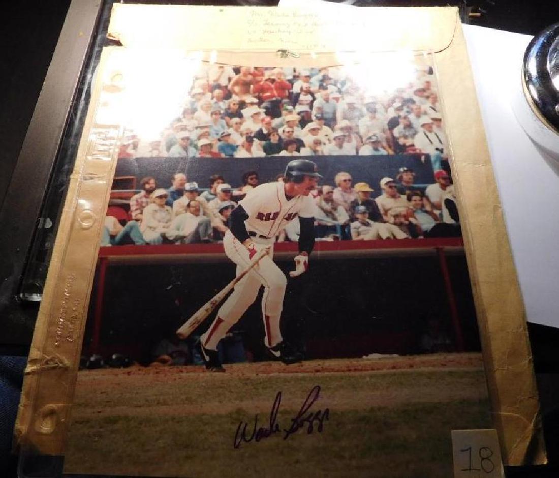 Wade Boggs Autographed 8" x 11" Color Photograph with: Hall of Famer Wade Boggs carries an outstanding lifetime batting average of 328.Â He played 12 consecutive all star games and was one of the most lethal weapons of the Boston Red Sox in in the 1980