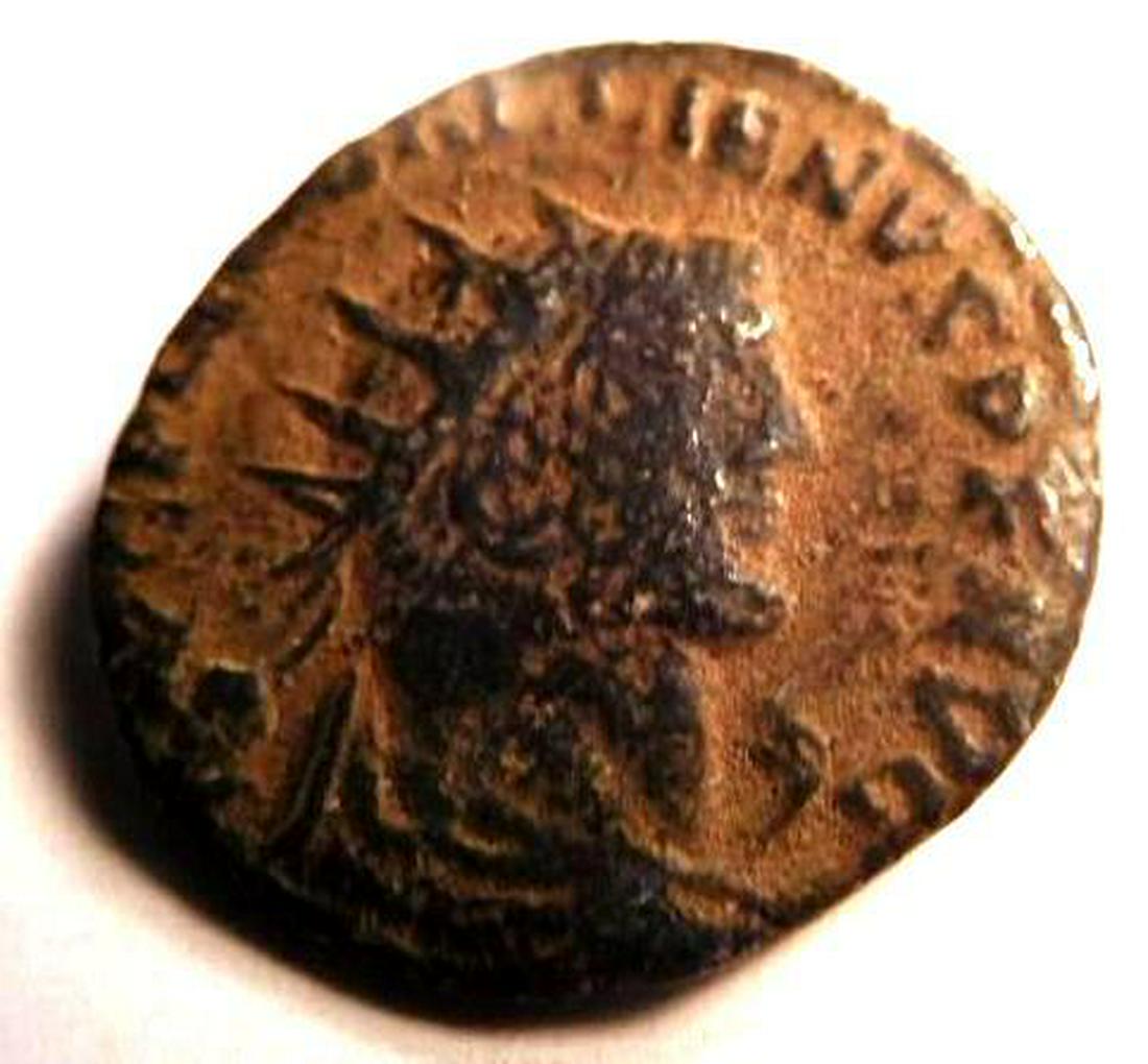 Bronze coin of Gallienus (253-265 A.D.): Gallienus, born in about 218 A.D., was the son of Valerian I. Valerian named him Caesar in 253 A.D. Gallienus' fifteen year reign is notable. During the instability of Crisis of the Third Century, civ