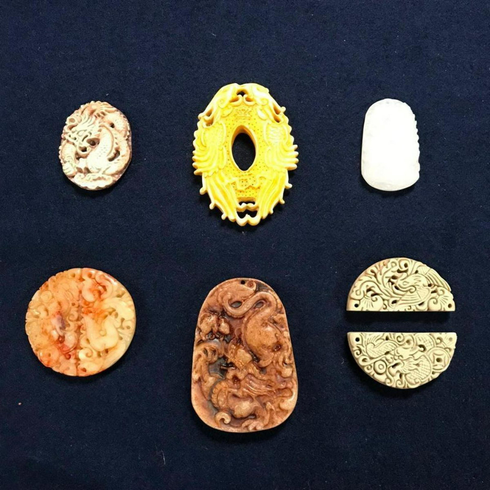 Asian Dragon & Phoenix Composite Stone Carvings,: Collection of six Asian dragon & phoenix pendants, totems, amulets - carvings or molds, made with stone & composite materials. 1 3/4" - 2 3/4".