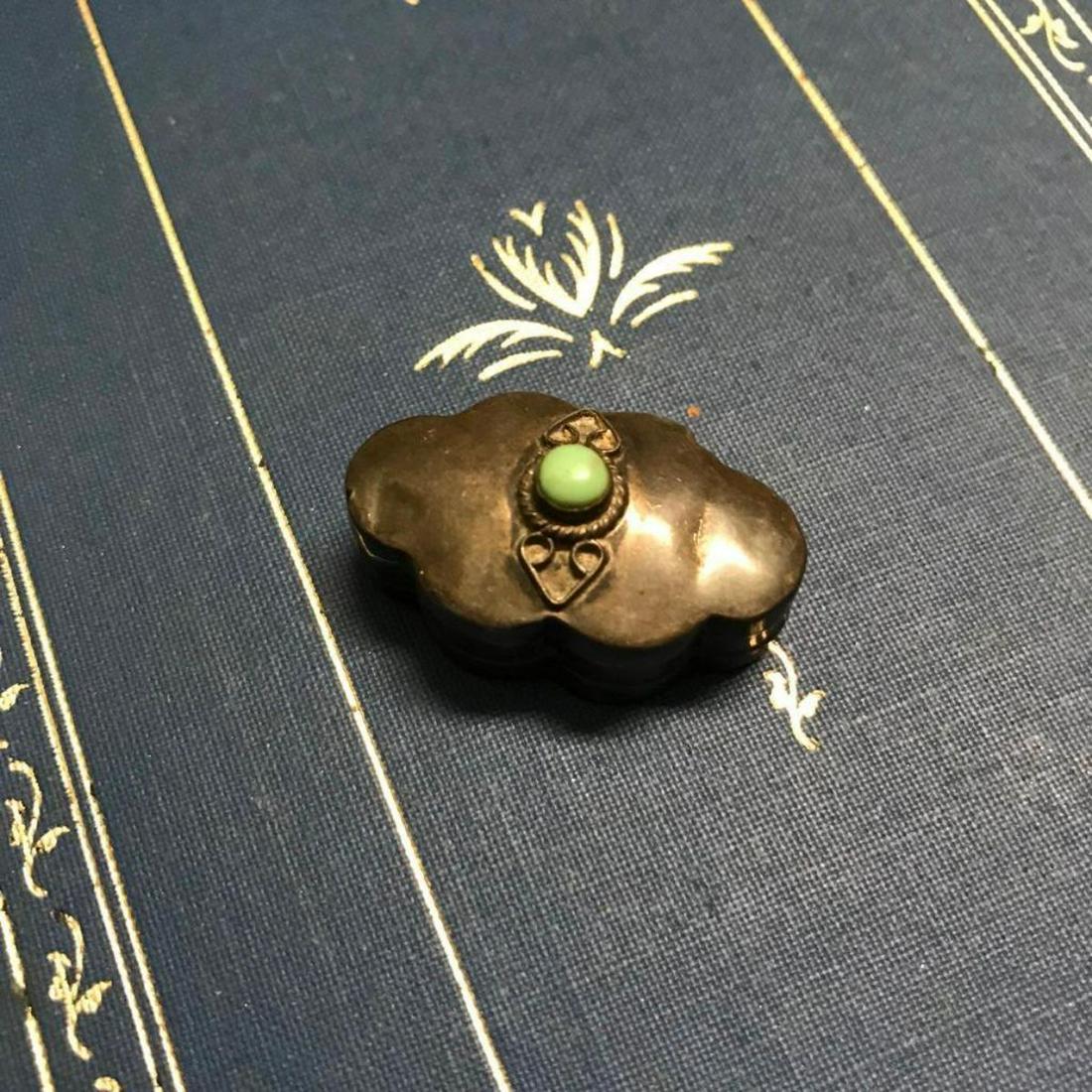 Vintage Mexico Sterling Tuquoise Pill Box: VintageÂ Mid 20th Century Mexican artisan sterling silver pill box with inset 3mm turquoise center stone & intricate silver wire decoration. * in need of polishing & several indentations to lid of b
