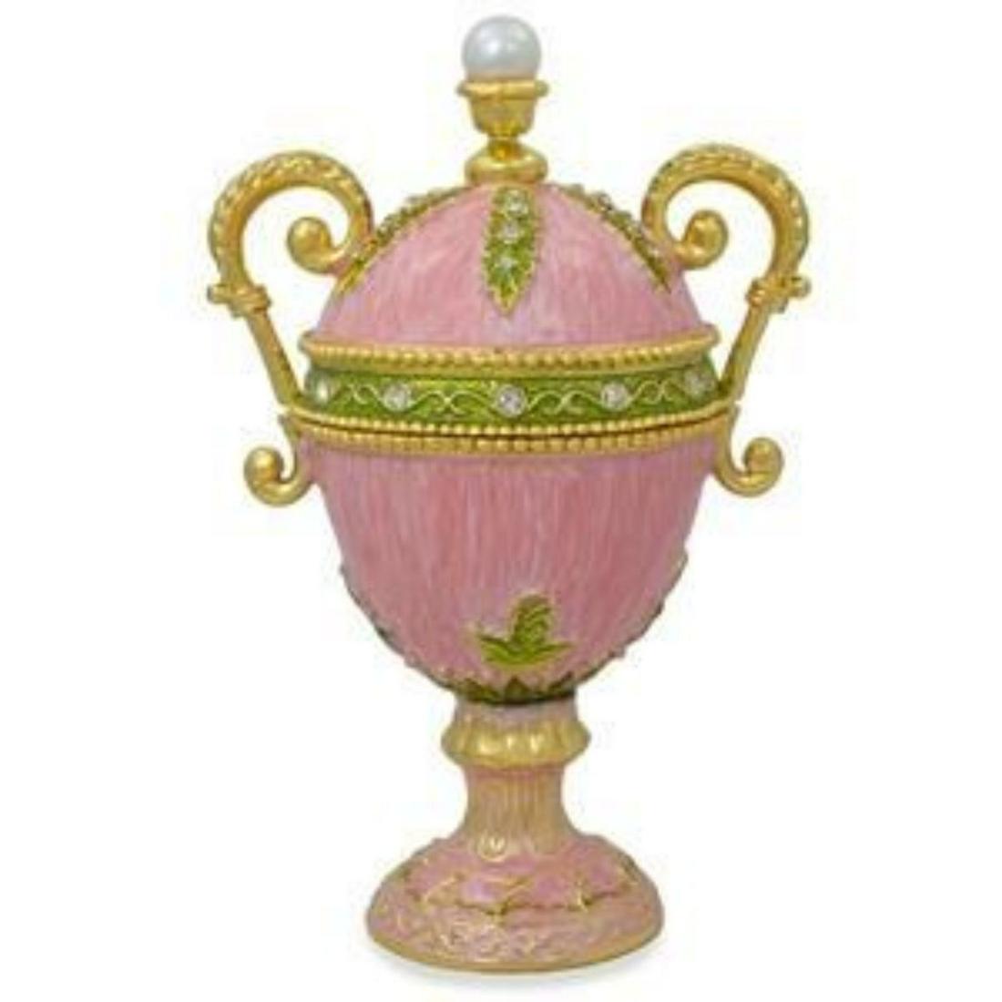5.5" Amphora Pink Enamel Faberge Inspired Egg Figurine: 5.5" Amphora Pink Enamel Faberge Inspired Egg Figurine Peter Carl Faberge is the world's most famous jeweler who created eternally original pieces of art. The series of Easter eggs created by Faberge 