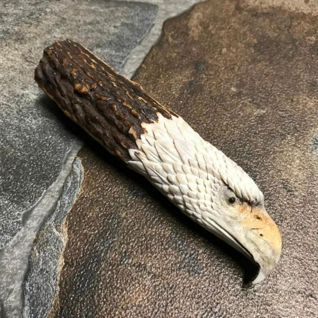 Hand-carved Shed Deer Antler, Patriotic Eagle Cane: Hand-carved shed deer antler, in the form of a patriotic eagle bird. For display or cane or dagger handle. 5" L X 1"D.