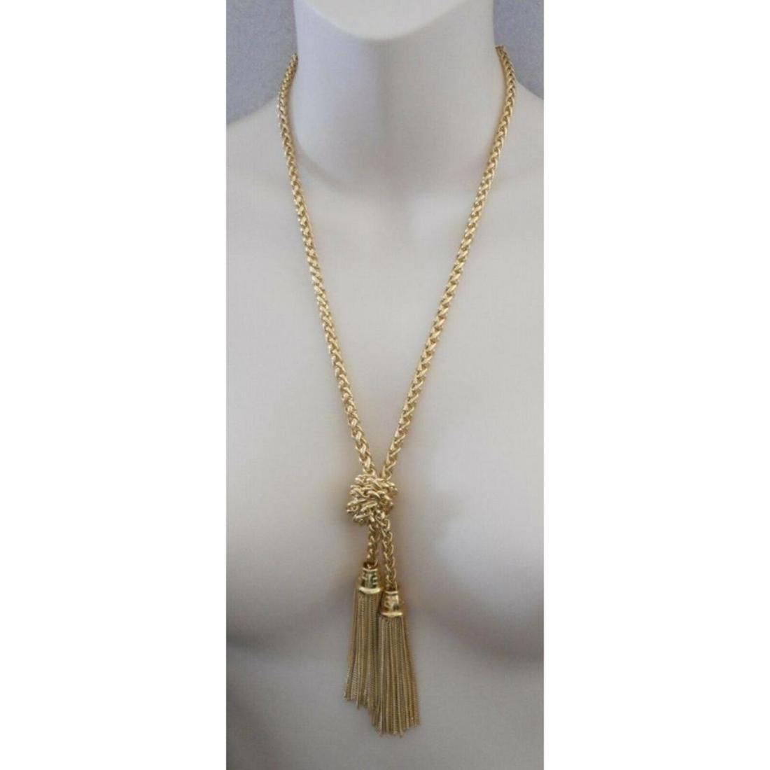 Beautiful Vintage Estate Gold Tone GIVENCHY Knotted: Beautiful vintage necklace by GIVENCHY, signed with logo hang tag. A pair of hanging tassels with etched cap on top of each. Knotted above. Gold tone braided chain. Small extended chain with hook clos