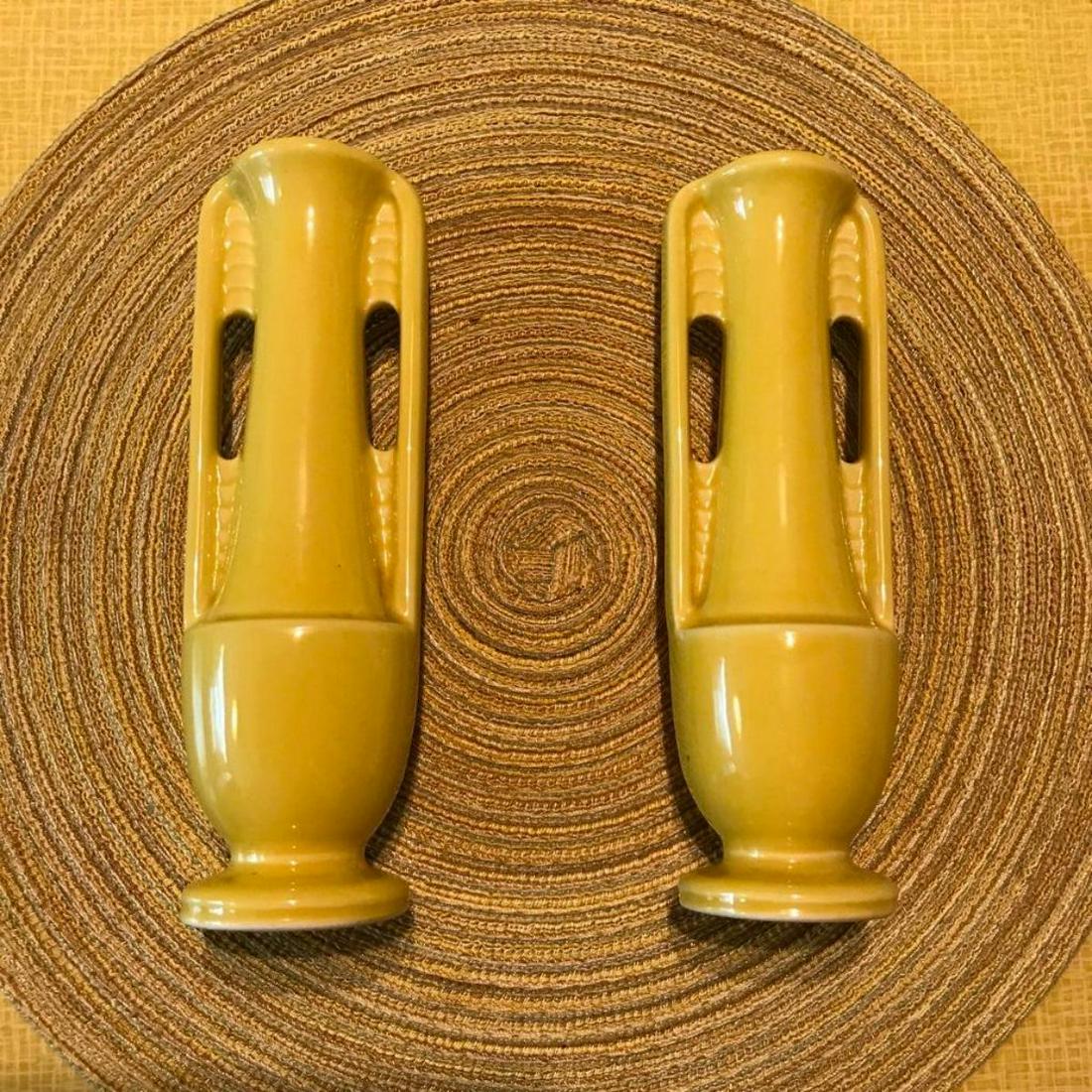 Rare Matching Pair of Golden Yellow Color, 1930's Art: Rare bright golden yellow color, matching pair of 1930's Art Deco Architectural style Shawnee pottery bud vases. 7 7/8" H X 2 3/4"W.