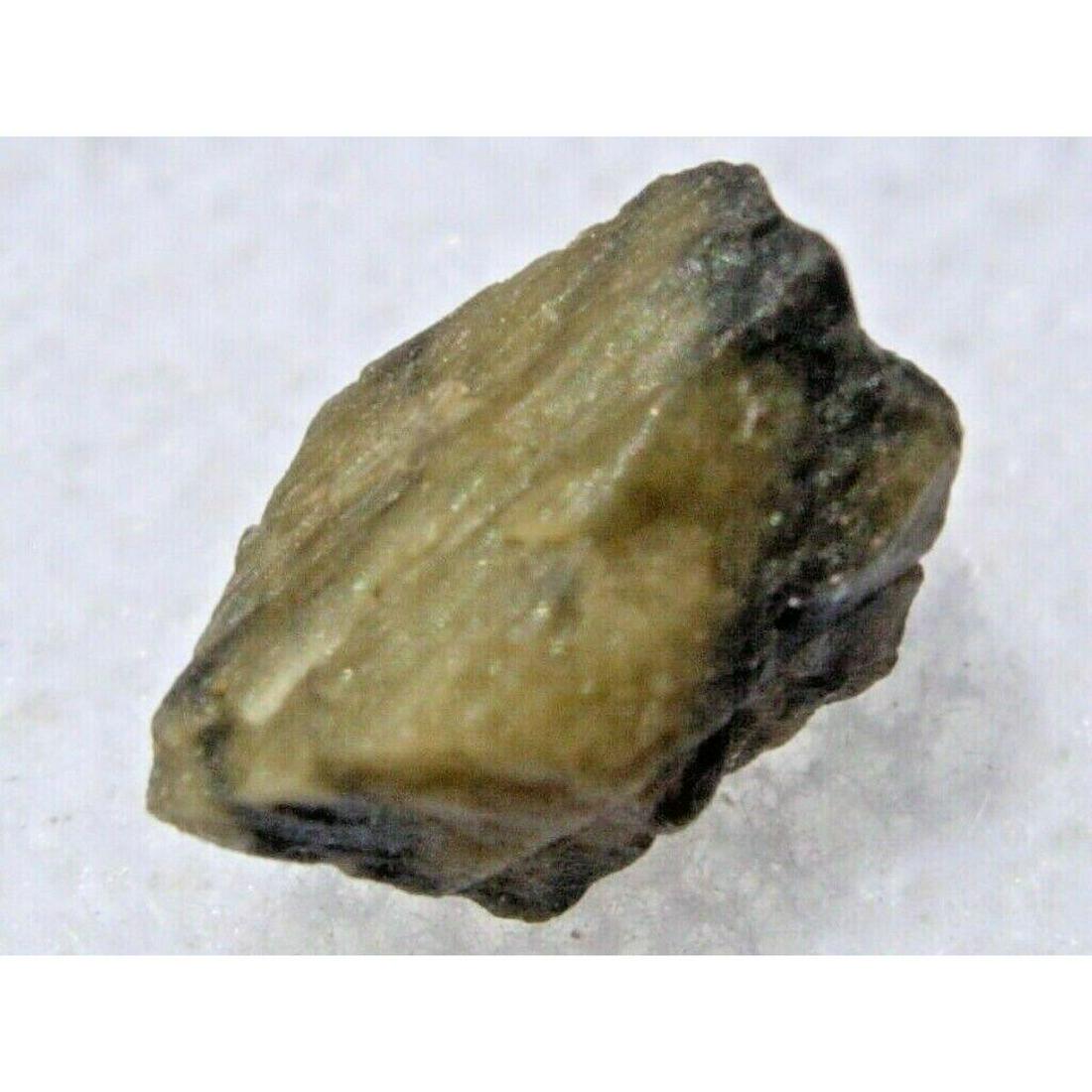 .267 grams TATAHOUINE Tunisia Green Diogenite Meteorite: Beautiful green with black veins, .267 grams,Â TATAHOUINE DiogeniteÂ Meteorite,Â fell to earth at 1:30 am on June 27, 1931 in FoumÂ Tatahouine Tunisia. The fireball was seen to explode & fragm