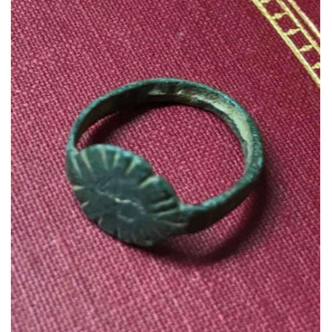 c.800 AD Bronze Byzantine Pilgrim's Ring, Artifact: c.800 AD bronze Byzantine pilgrim's ring, artifact, with radial lines to the sides & circular boardered top plate. Wearable size of approx 4 1/2 - 4 3/4.