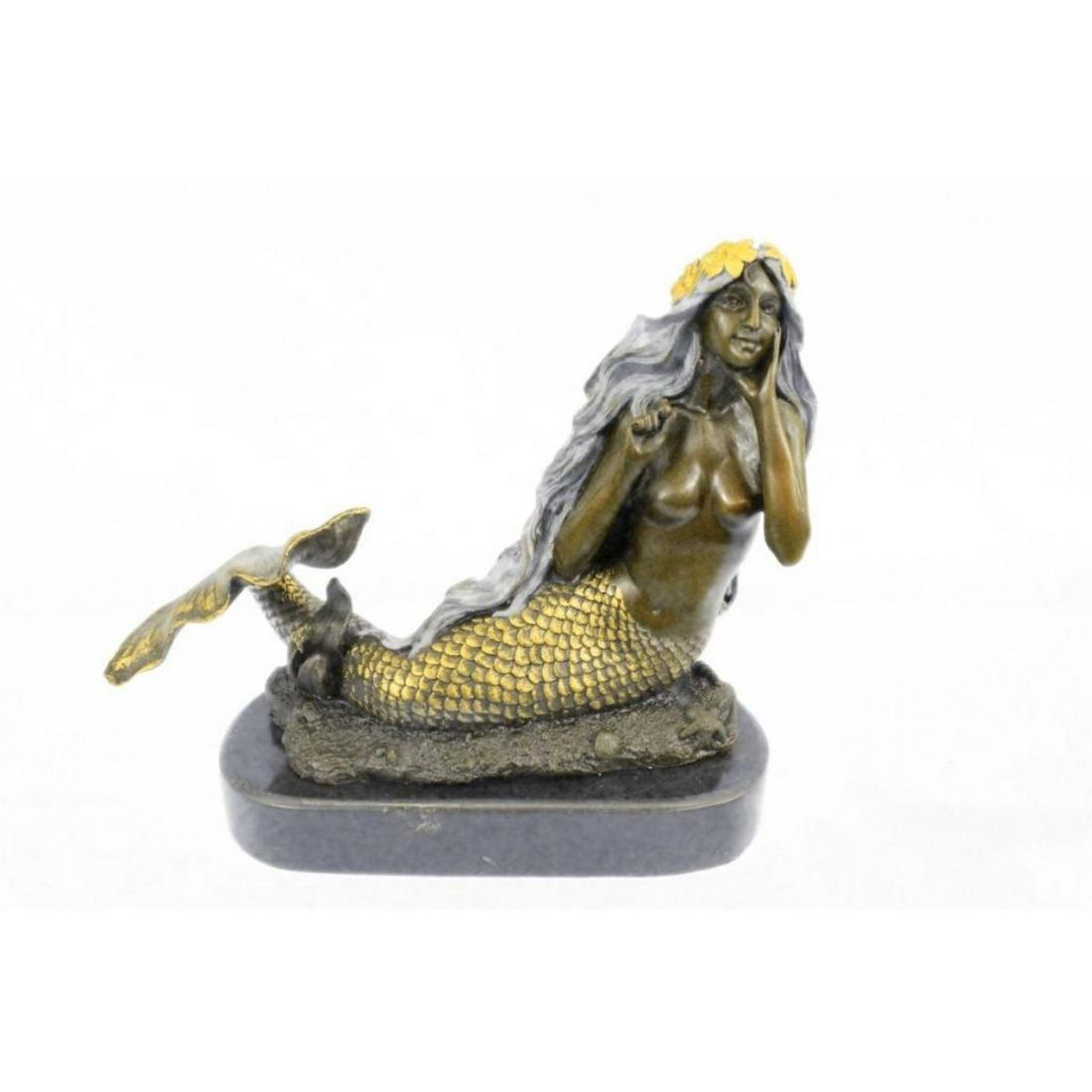 Signed Fantasy Mermaid Bronze Sculpture: Beautiful fantasy mermaid sculpture, lost wax casting method bronze, with applied gold gilt & green patina. Signed Milo. 8 1/2" X 10 1/2". 9lbs.