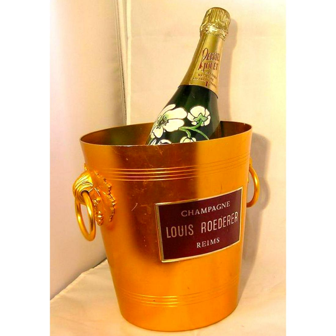 CHAMPAGNE LOUIS ROEDERER Reims Ice Bucket: A very collectible gold toned metal champagne ice bucket advertising Louis Roederer,Â the French champagne to the Russian Tsars. Beautiful grape leaves & grape bunch at the loop handles. Most likely