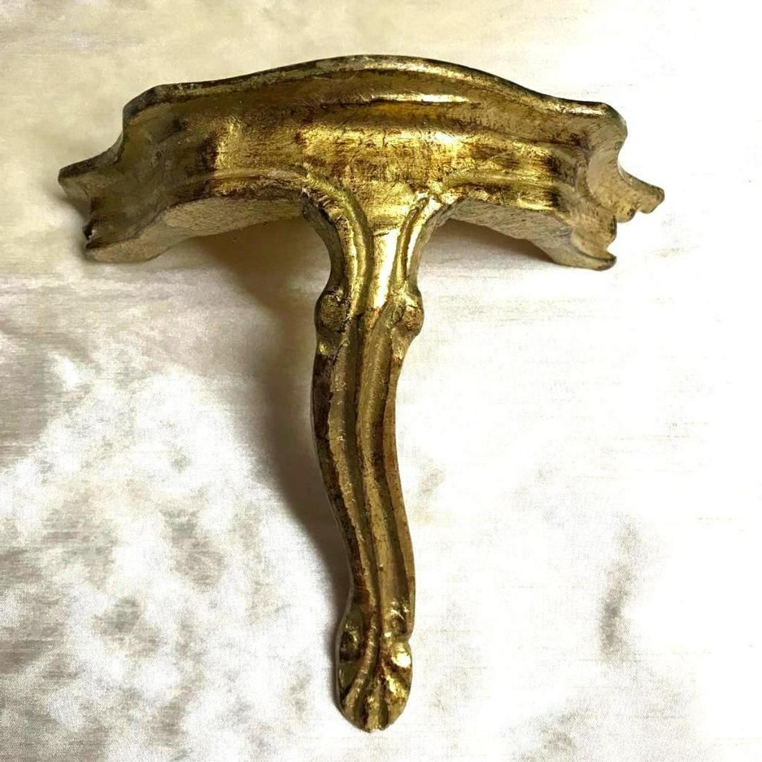 Florentine Italian Gilt Wall Shelf Bracket: Florentine Italian gold gilt over lightweight composite wood wall shelf bracket. 7 1/2" H X 7 3/4" W X 3 1/2" D. *stamped on the reverse side " Made In Italy".