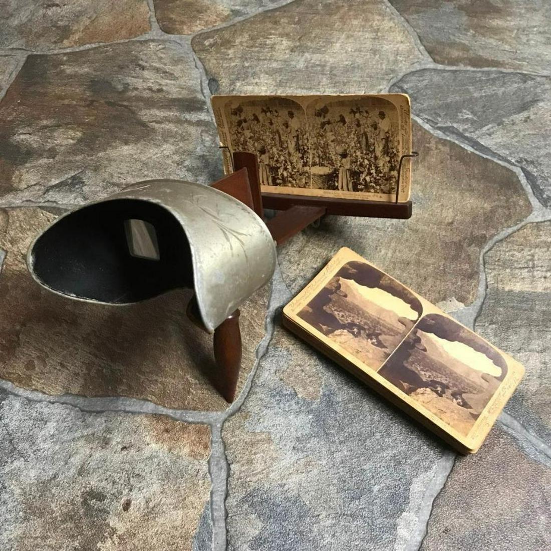 Late 19thc Underwood & Underwood Stereoscope Viewer &: Late 19thcÂ Underwood & UnderwoodÂ hand-held stereoscope viewer, with flip out wooden handle & 14 stereoscope slides including: Cotton Is King, 1895 Plantation scene with sharecroppers, ladies sip