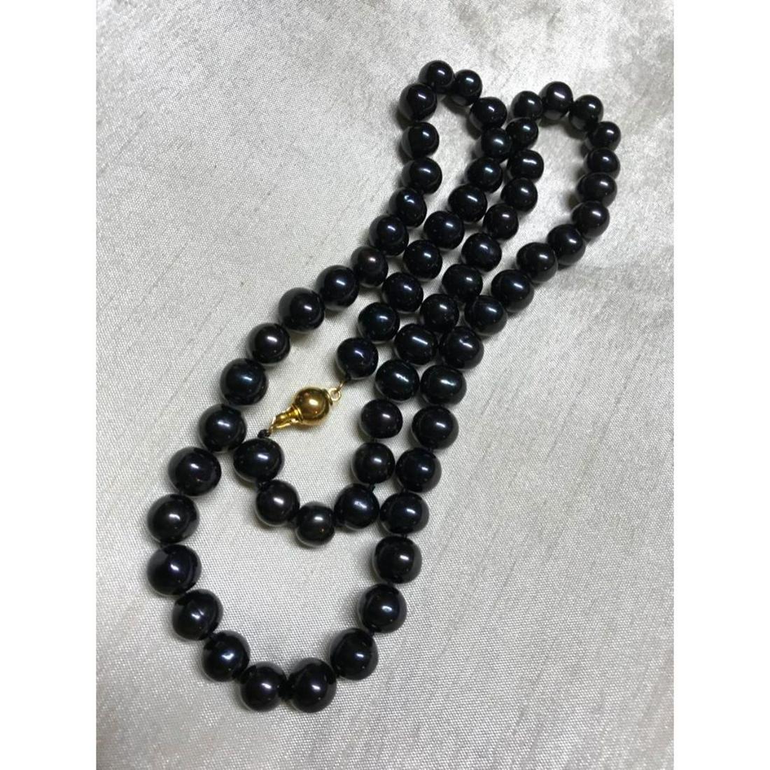 8-9mm Black Tahitian Pearl 23" Necklace: 8-9mm Black Tahitian Pearl 23" necklace with 14kt gold ball clasp.