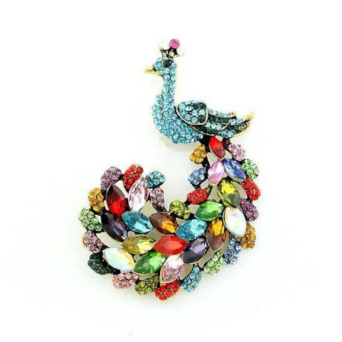 Multi-colored Rhinestone Peacock Brooch Pin: Beautiful teal blue & multi-colored rhinestones set into a silver-tone Peacock form brooch pin. 2 3/4" H X 1 3/4" W. -10049-032418-ES-14179