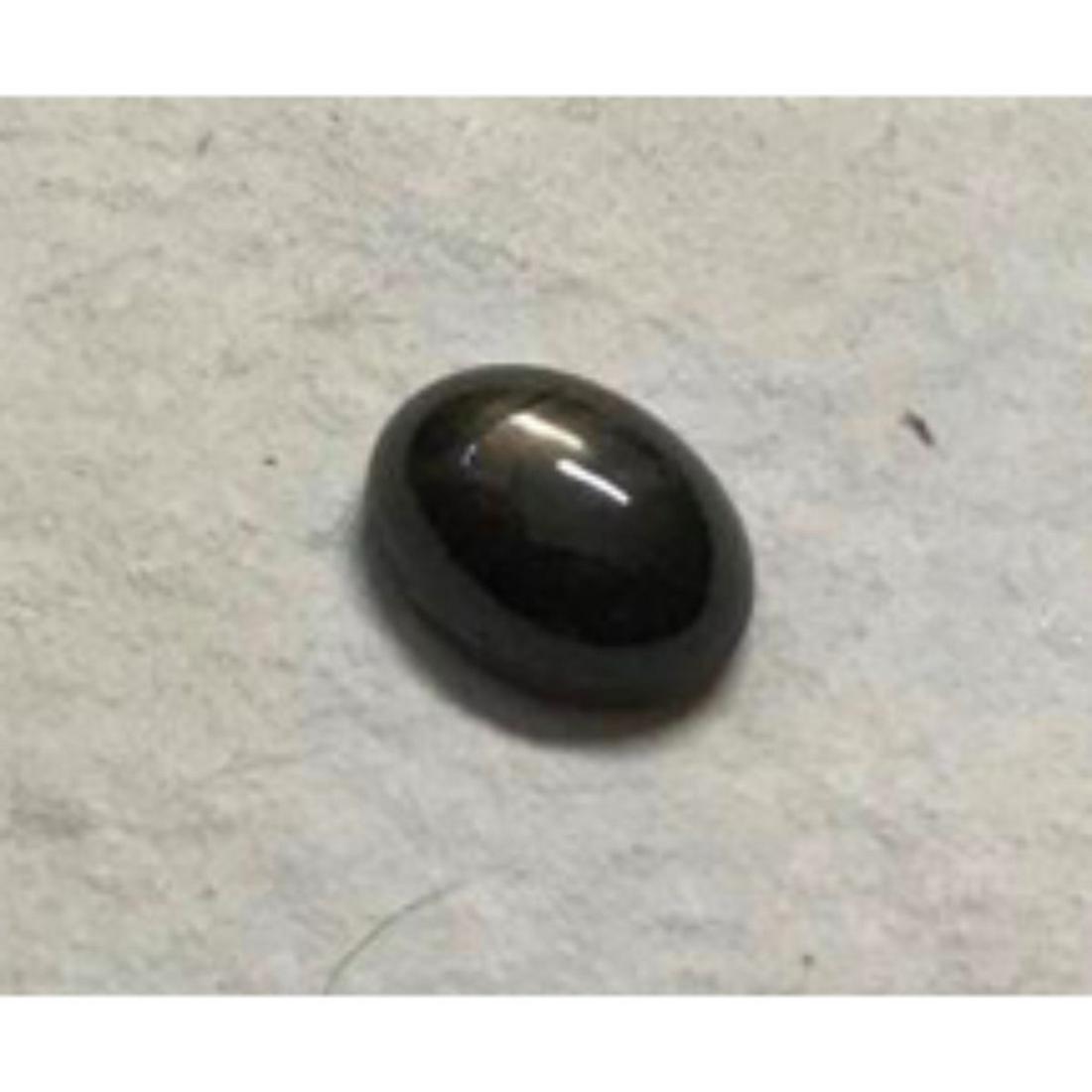 2.26ct Ethiopian Welo Black Opal Cabochon: 2.26ct Ethiopian Welo black opal cabochon. 6 X 8mm. Ready to be set as a beautiful ring or pendant. 