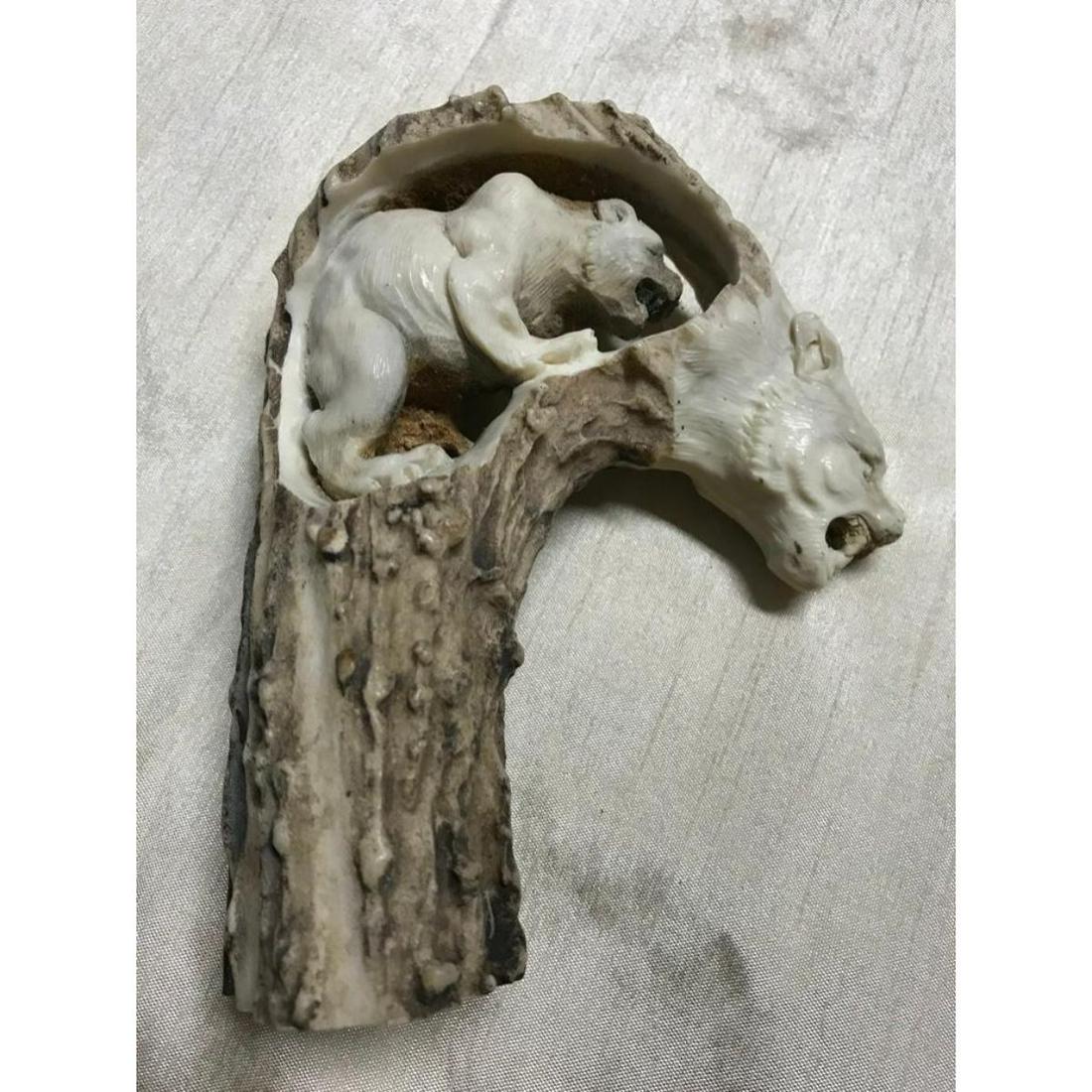 Mountain Lion, Cougars Hand-carved Deer Antler Walking: Two cougars, mountain lions master hand-carving from a shed deer antler. Walking stick or cane handle display. 5"H X 4 1/4" W X 2" thick.
