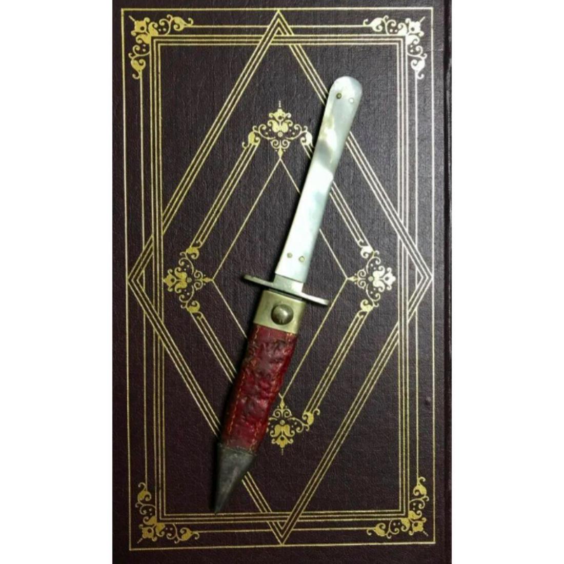 1800's Sheffield Gambler's Dirk, Prostitute's Mother of: 19th Century Alexander Sheffield, NY gambler's dirk, prostitute's boot knife, with mother of pearl handle & leather & brass sheath. 2 7/8" blade. 6 1/2" overall length. Stamped Alexander Sheffield on 
