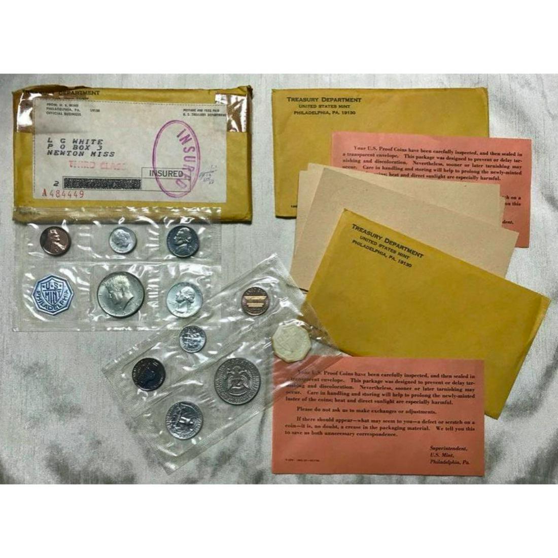 1964 U.S. Silver Proof Coin Sets, GEM Proof ( Original: 1964 U.S. Silver Proof Coin Sets, ( 2 total ) GEM Proof in original government packaging, with original mailing envelope, addressed to sender. Recently discovered in a safe in Mississippi where they h