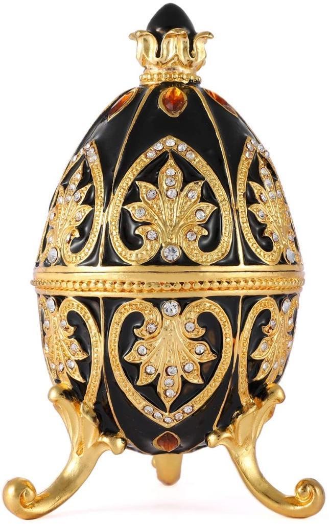 Russian Black Enamel Trinket Jewel Box Egg: Russian ornate jeweled trinket box egg. Enamel & gilt over pewter with Austrian crystals. The tri-footed egg opens at center on a hinge to reveal an enameled interior for storing trinkets or jewels. 4