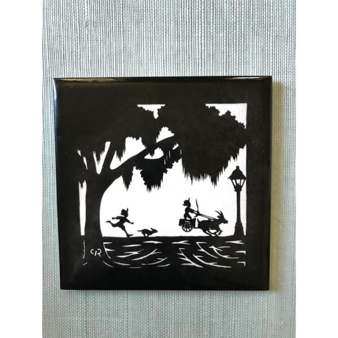 Vintage Carew Rice Lowcountry Silhouette Ceramic Art: Vintage 1960's printed ceramic art tile, created by Deland Studios, after an original paper silhouette of Carew Rice ( 1899 - 1971 ) depicting a boy chasing his dog, chasing a goat cart. 6" X 6" tile 