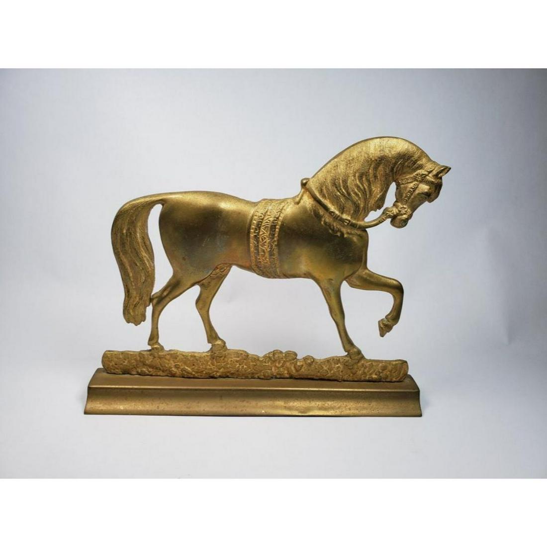 Antique Early 1900's Brass Horse Doorstop: Antique brass doorstop in the form of a horse. Unpolished, but very good condition. Stands 9" H X 11" W. 2 lbs 6oz weight. It is unmarked but I believe this to have been made by Havin Co in the early 