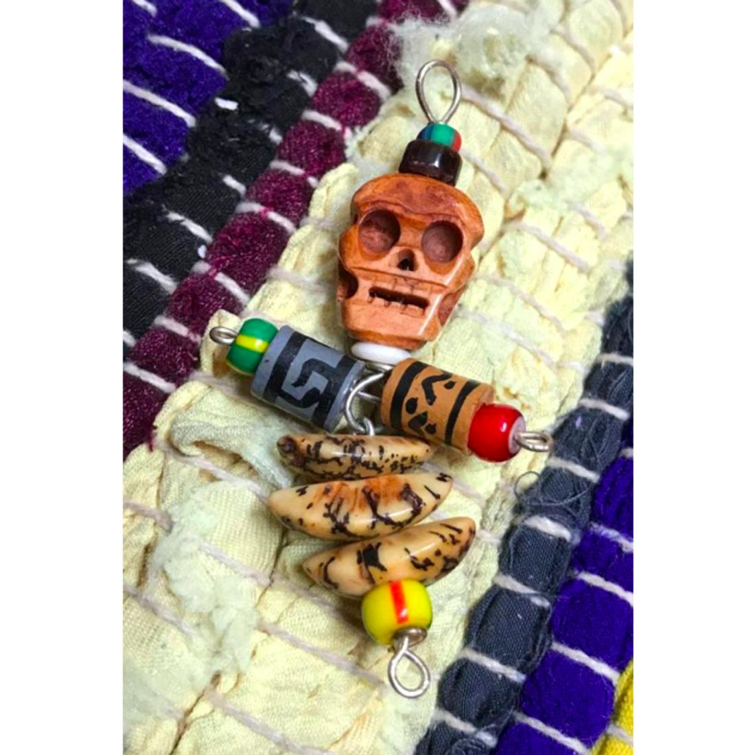 Carved Bone & Art Glass Bead Skeleton Calavera Pendant: Hand-carved bone & art glass bead skeleton Calavera pendant. 2 1/4" L.