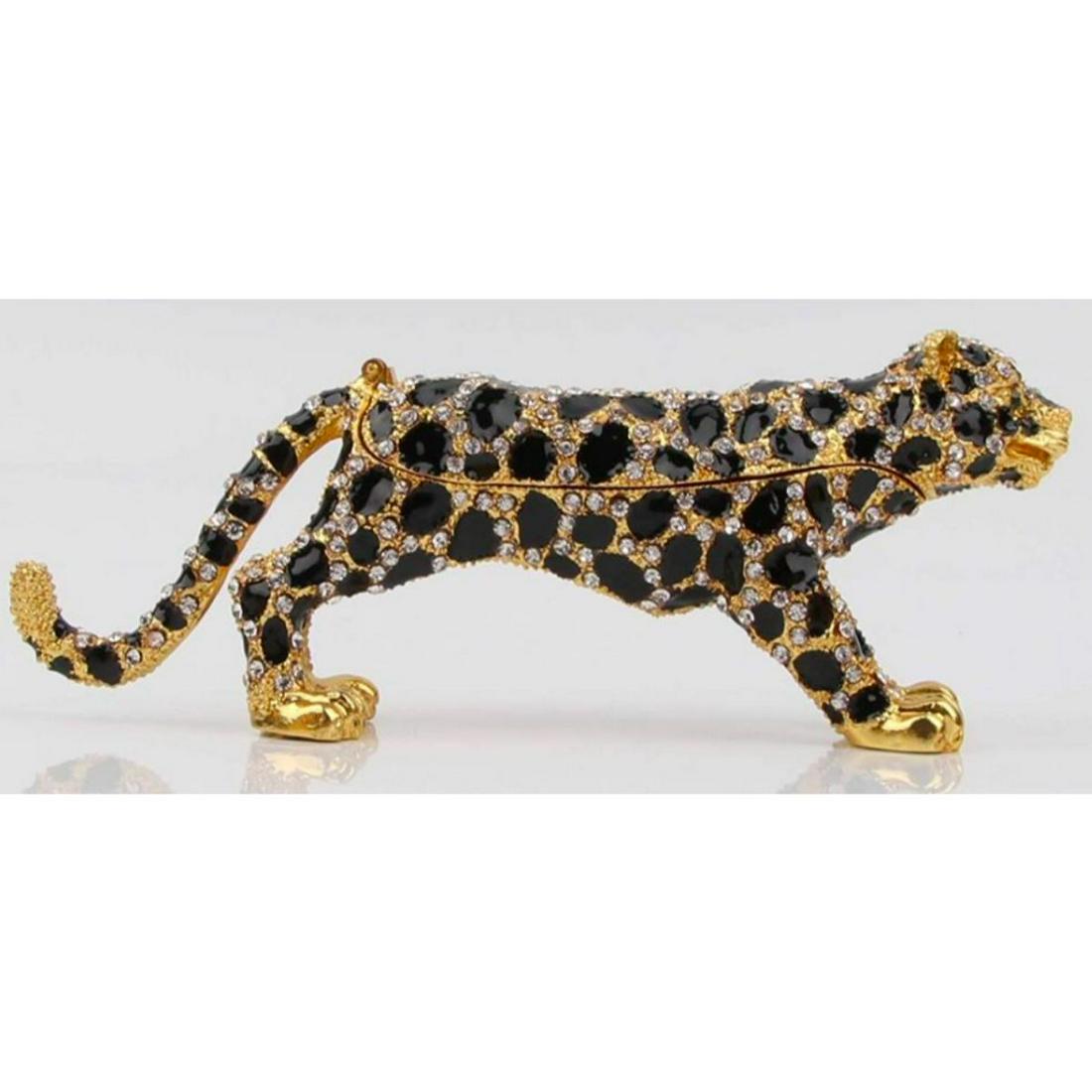 Swarovski Crystal Leopard Trinket Jewel Box Figurine: Leopard trinket, jewel box figurine. Enamel & gilt over pewter, with embedded Swarovski crystal elements. The top of the leopard opens, on a hinge, with magnetic closure, to reveal an enameled interio