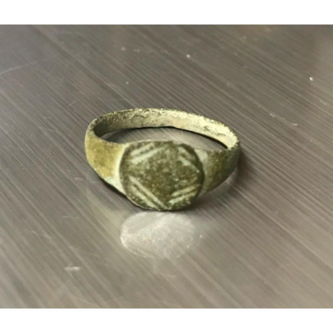 4th-6thc AD Roman - Early Byzantine Artifact, Pilgrim: 4th - 6th Centuries AD, Roman - Early Byzantine artifact, pilgrim's ring belonging to a child. Rounded bezel with an incised diamond motif. The term Byzantine originated in the 19th Century. Until the