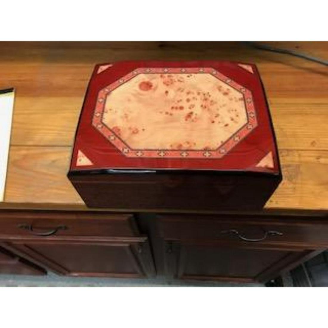 Large Hand-made Humidor Treasure Chest: Large humidor-treasure chest in Daniel Marshall style. Handmade by Cuban Crafters.12x10x5 size ( large ). Heavily lacquered & inlaid wood. A beautifully made humidor.