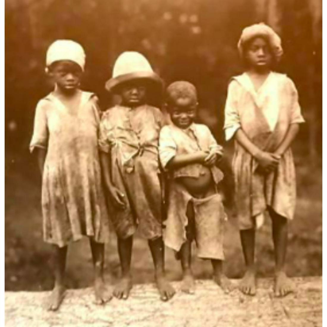 African American History, Four Children On Log Sepia: African American History, slavery, rural America theme, sepia-tone photo prints, on heavy card stock. "Four Black Children In Rags On A Log". Created from original photos of the 19th Century for The A