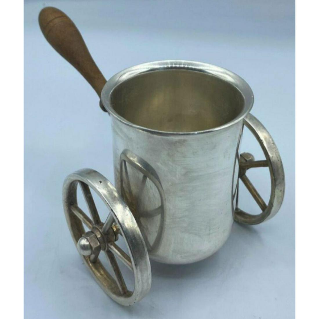 Vintage Victoria Silver Plate Tea Rolling Cart Creamer: Vintage Victoria silver plate rolling cart creamer with wooden handle. 3 1/8" H X 2 1/2" W.