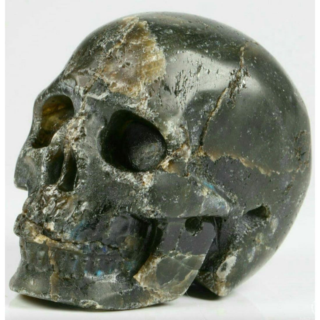 Carved Labradorite Gemstone Skull: Carved Labradorite Gemstone Skull. 2" x 1 1/2" x 1" ( 51x39x31mm ) 3.1 oz weight ( 88g ).
