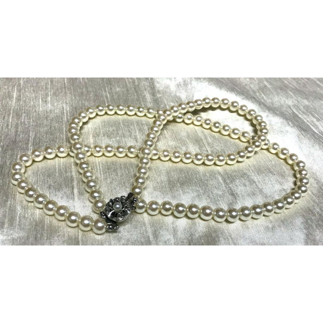 Mid-Century Faux Pearl Necklace: Lovely mid-century faux pearls, double-strand, choker-style necklace with silver plated with faux pearl clasp.